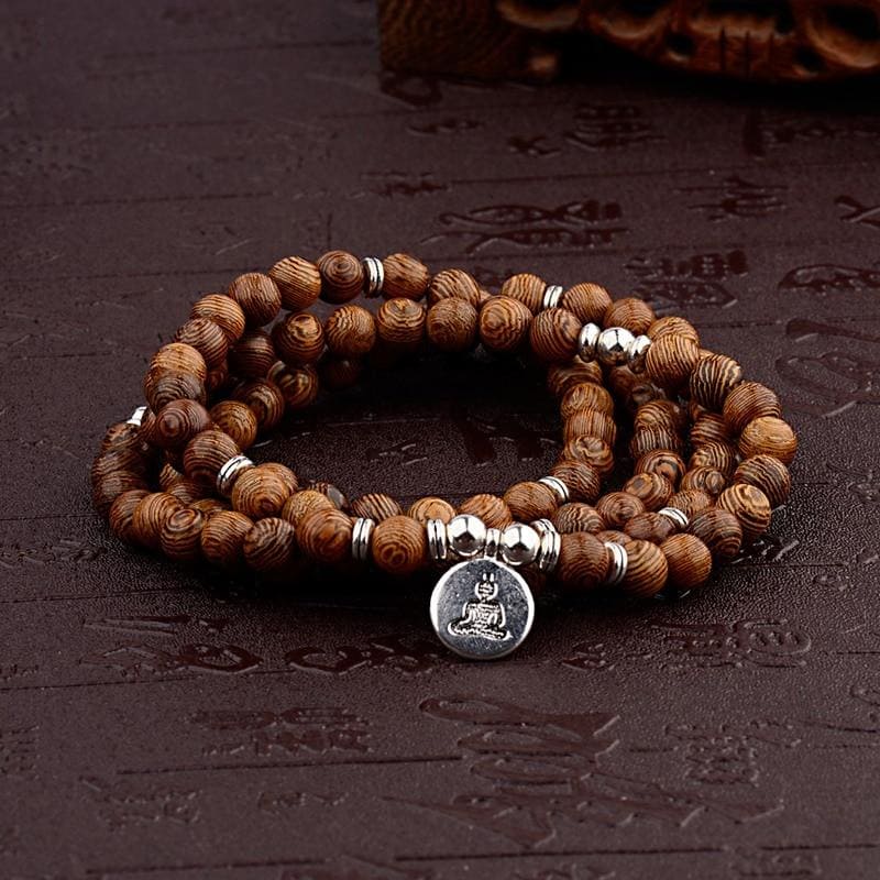 bracelet mala en bois bouddha tibetain
