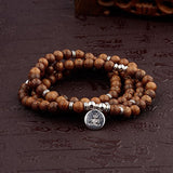 bracelet mala en bois bouddha tibetain